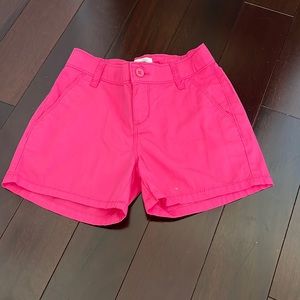 Hot pink children’s shorts.